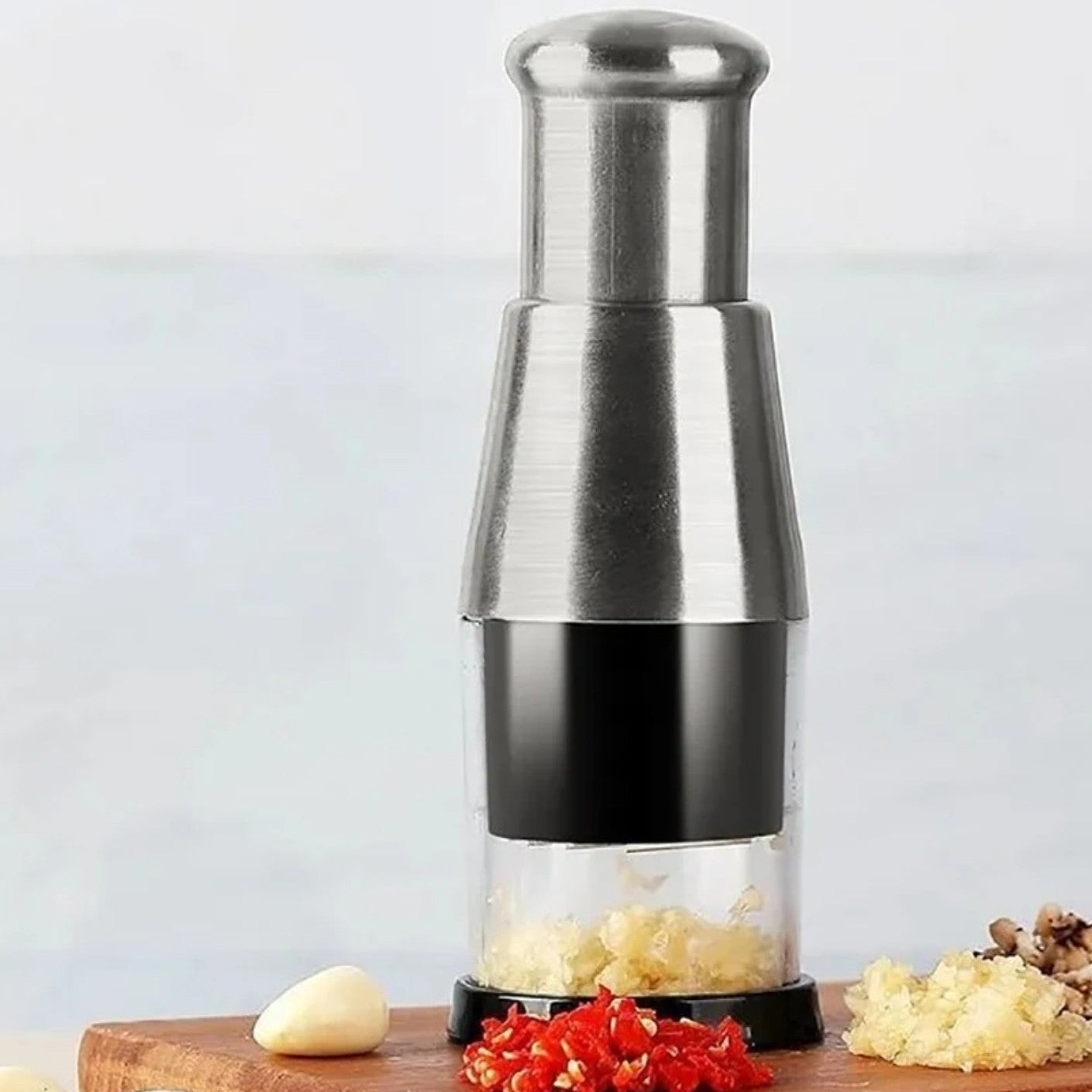 Tocator manual pentru fructe si legume, Zola, 5 lame, rotire automata, otel inoxidabil, 16 x 6 cm, negru/argintiu Tocator manual pentru fructe si legume, Zola, 5 lame, rotire automata, otel inoxidabil, 16 x 6 cm, negru/argintiu